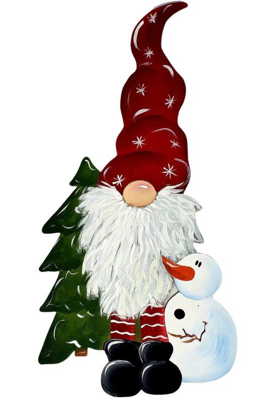 painted wood cut out gnome with a red hat and red pants, a snowman is hugging the gnome and has a white body, black buttons, brown stick arm, and orange carrot nose. There is a bright green tree beside the gnome as well.